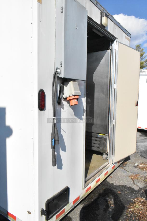 Nationwide 24' cold food trailer, new 2021, open side door, power cables visible, equipped for food service.