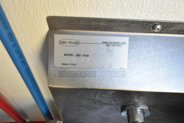 Label on metal surface showing Serv-Ware model BS1-1818, website, and contact number. Made in China.