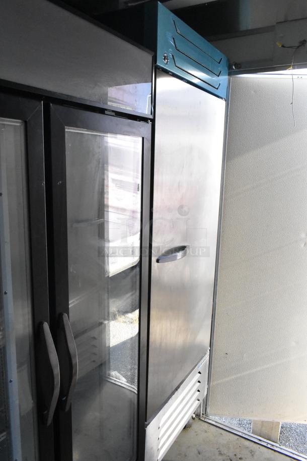 Two commercial-grade fridges, including a Beverage Air reach-in cooler, inside a Nationwide 24' food trailer.