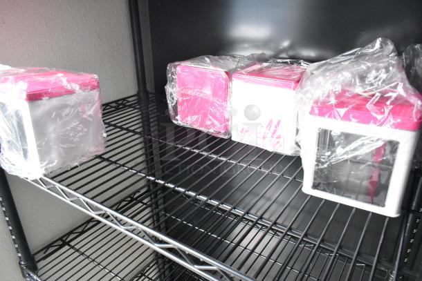 Plastic-wrapped, pink-lidded food storage containers on metal shelves. Ideal for food retail use. New condition.