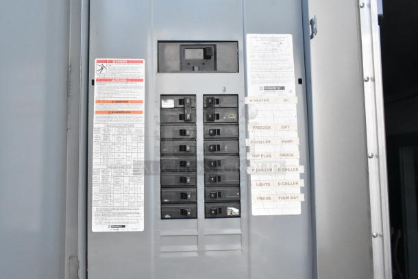 Electrical panel inside Nationwide 24' food trailer with labeled circuit breakers for appliances like freezer and AC.