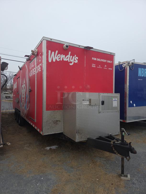 Red Wendy's delivery trailer with branded logos, "For Delivery Only" text, and delivery service logos. Well-maintained condition.