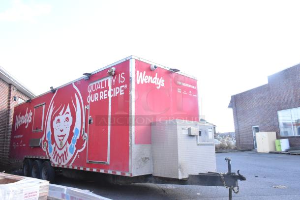 Red Wendy's food trailer with logo, "Quality is Our Recipe" text, delivery service logos, and service window. Good condition.