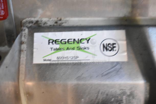 Regency stainless steel table, model 600HS12SP, with NSF certification label.