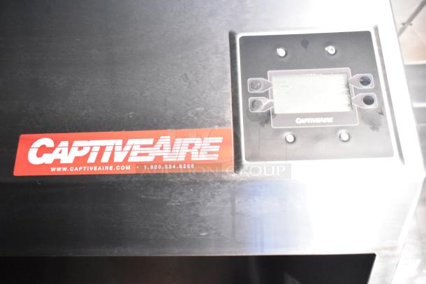 CaptiveAire kitchen equipment with control panel and branded label, indicating model and contact info. Good condition.