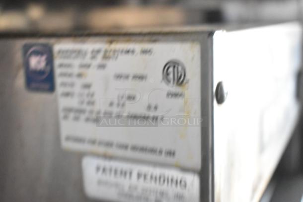 Industrial equipment label, partially visible. Shows certification marks and "PATENT PENDING" note. Details blurred.