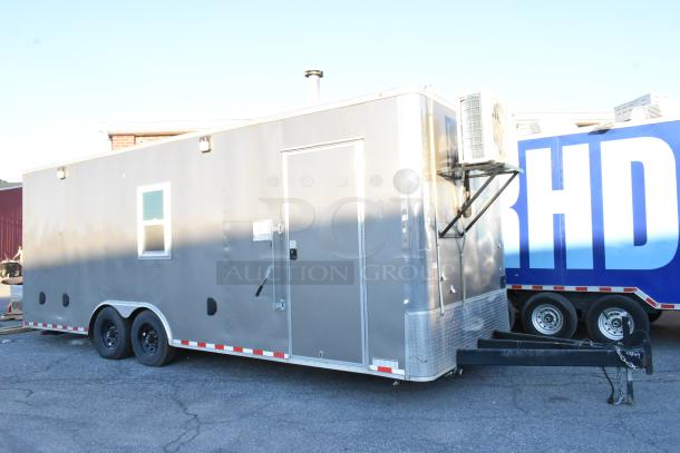 24' Nationwide retail trailer, new in 2021, gray exterior. Fully equipped for bakery/cold food, commercial-grade gear included.