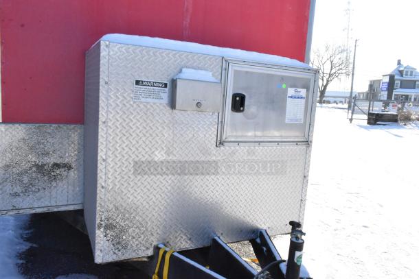 28' Wendy's fast food trailer with diamond plate exterior, warning labels, and water access hatch, ready for use.