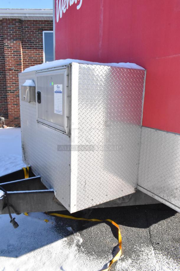 28' Wendy's fast food trailer with diamond plate exterior, featuring commercial-grade kitchen equipment and clear title.