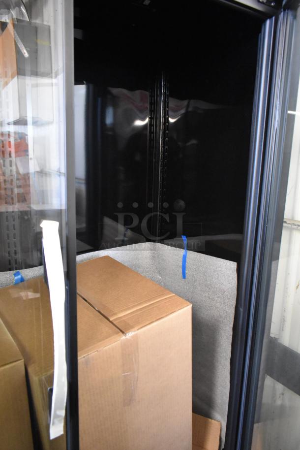 Brand new 2025 True TVM-48SL-HC commercial 2-door reach-in cooler, 115 volts, minor dents, includes packing boxes.