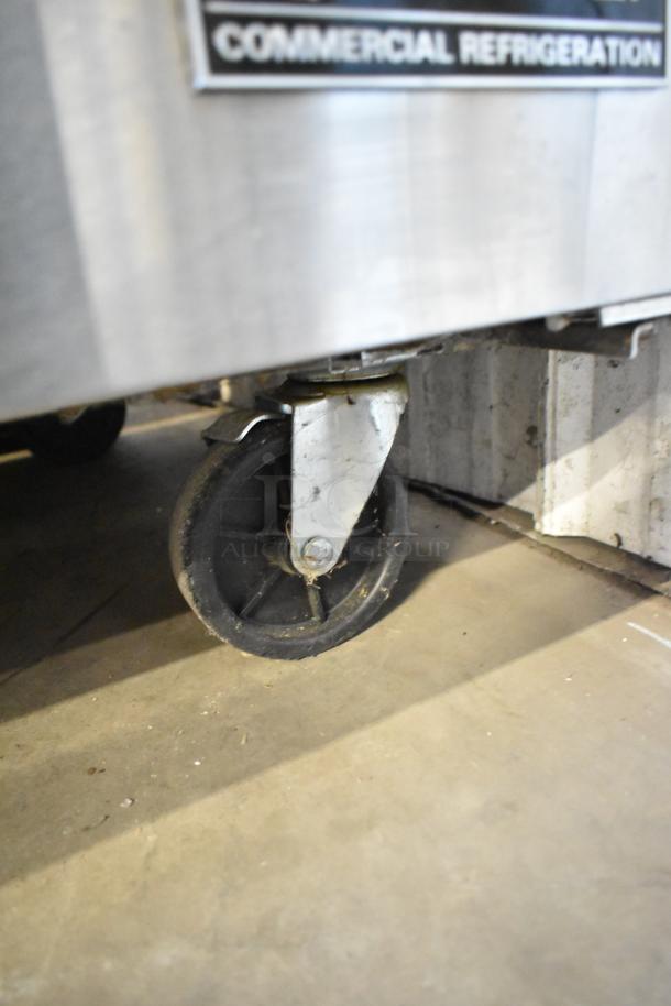 Polar MSF8307 Stainless Steel Bain Marie with casters, visible wheel, label reads "Commercial Refrigeration."