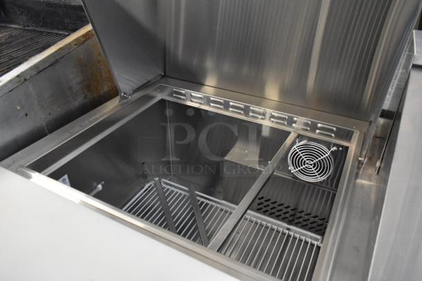 Polar MSF8307 stainless steel Bain Marie mega top. Features commercial casters, interior shelves, fan. 115V, 1 phase.