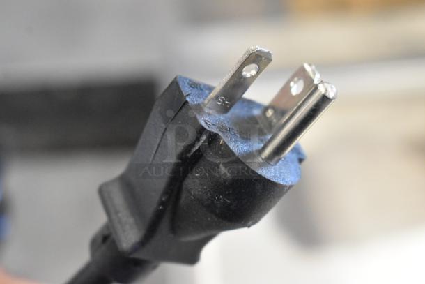 Close-up of a plug for the Estella HS60S Spiral Dough Mixer, 240 volts, showing three-prong configuration.