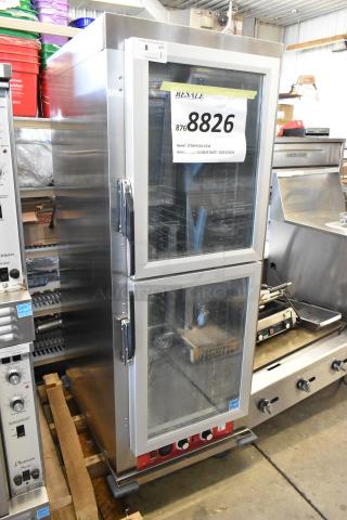 Brand new Avantco 177HPESDC1836 heated cabinet with clear Dutch door. Scratch and dent condition. 120V, 1 Phase. Tags visible.