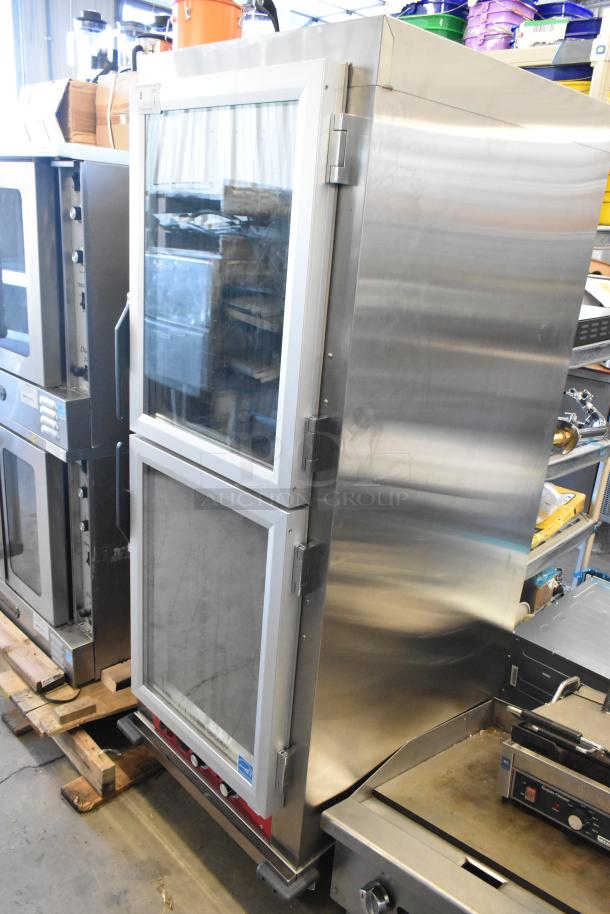 Brand new Avantco 177HPESDC1836 vacuum-insulated heated cabinet. Clear Dutch door, commercial casters, minor scratches.