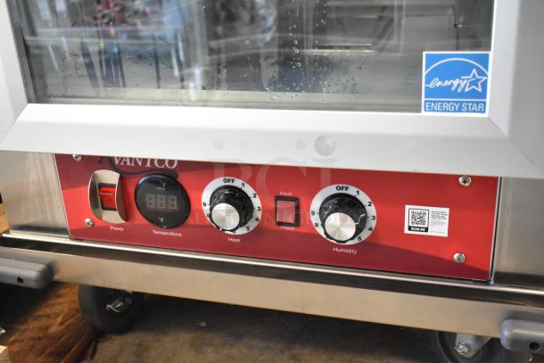 Avantco 177HPESDC1836 vacuum-insulated heated cabinet, clear Dutch door, temperature controls, commercial casters, Energy Star label.