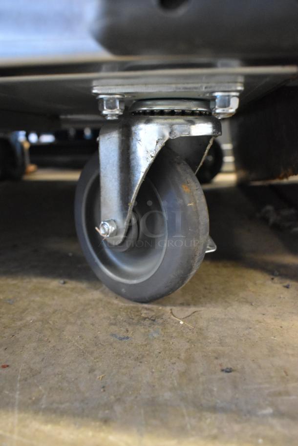 Avantco 177HPESDC1836 cabinet caster wheel, showing heavy-duty construction, part of brand new vacuum-insulated cabinet.