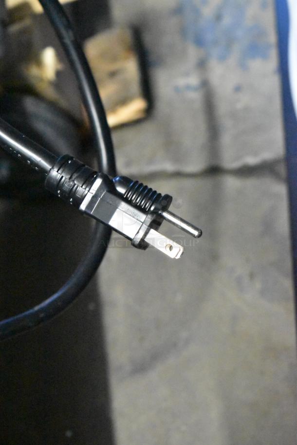 Power cord of the Avantco 177HPESDC1836 Heated Holding Cabinet, showing a standard 120V plug.