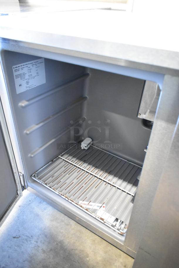 2018 Delfield UC4048P-STAR stainless steel 2-door undercounter cooler, commercial casters, 115V, 1 Phase. Interior view.