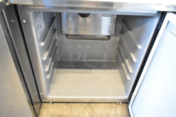 2023 Delfield 406P-STAR2 stainless steel undercounter cooler, single door, clean interior, on commercial casters, 115 volts.