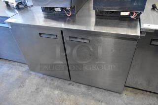 2018 Delfield stainless steel 2-door undercounter cooler, commercial casters, 115V, 1 phase, good condition.