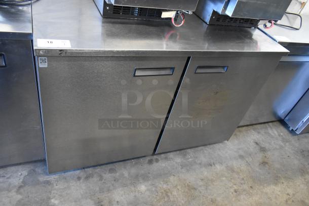 2018 Delfield stainless steel 2-door undercounter cooler on commercial casters, 115V, 1 phase, in used condition.