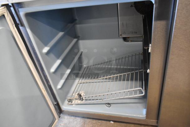 2018 Delfield stainless steel 2-door undercounter cooler, commercial casters, 115V, 1 phase, good condition.