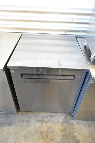 Delfield stainless steel undercounter cooler, single door, on commercial casters, 115 volts, 1 phase, in good condition.
