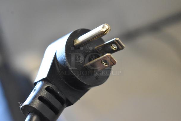 Delfield stainless steel undercounter cooler, single door, on commercial casters. 115V, 1 phase, commercial use.