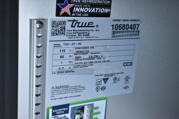2023 True TUC-27-HC undercounter cooler label, showing model, voltage, and refrigerant details. Serial: 10680407.