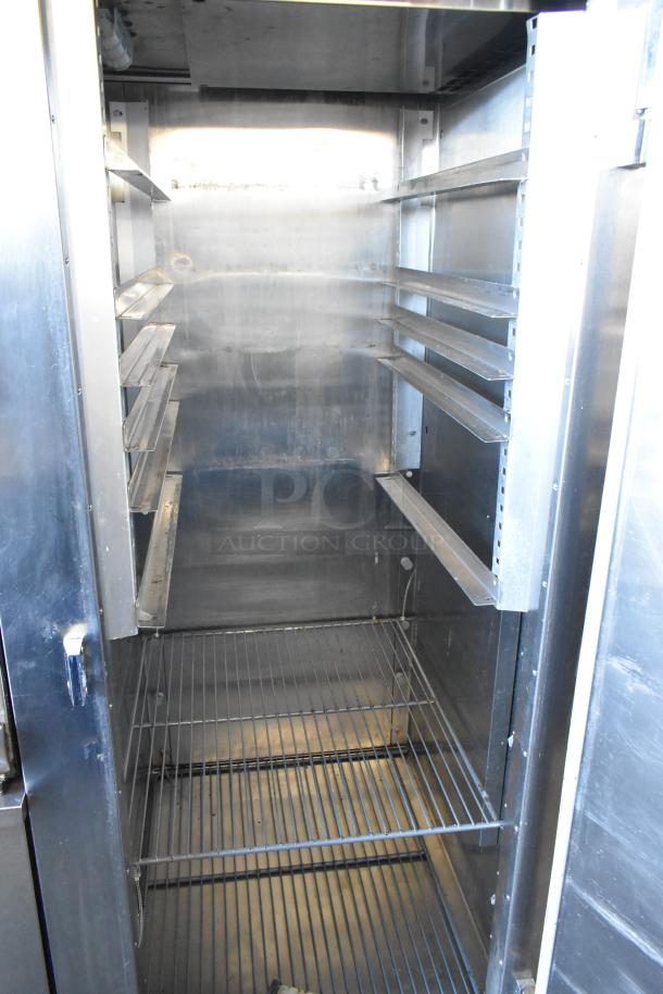 Traulsen RHT132WUT-FHS stainless steel reach-in cooler, single door, adjustable shelves, 115 volts, excellent condition.
