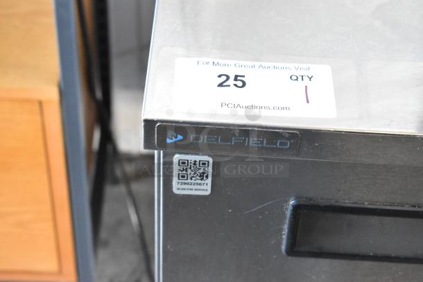 2018 Delfield 406P-STAR2 stainless steel single door undercounter cooler with QR code and label on casters, 115 volts.