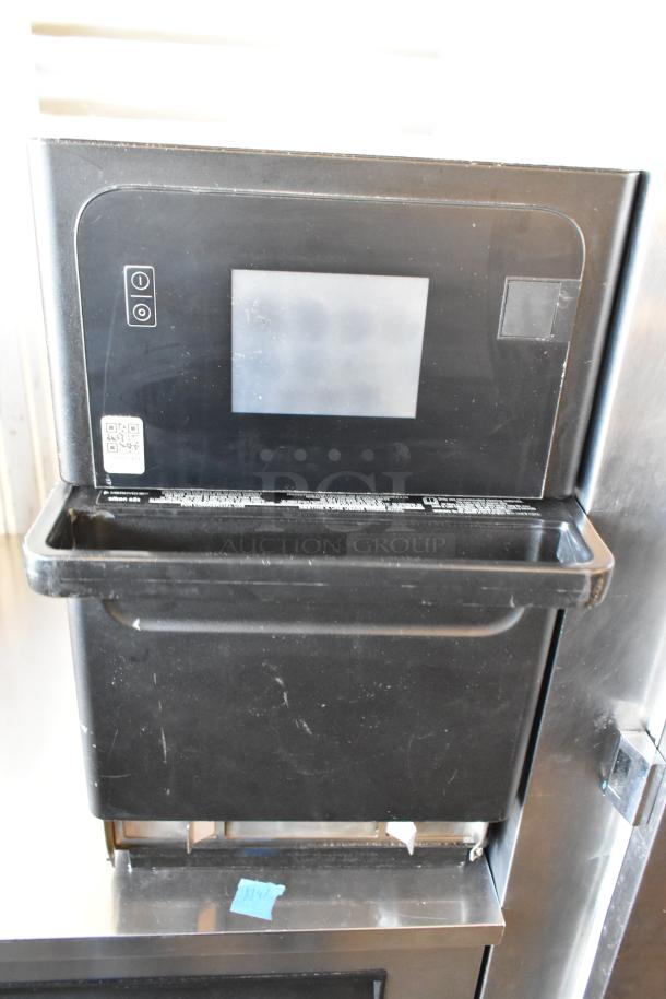 Merrychef eikon e2s commercial rapid cook oven, black metal, countertop model, 208/240V, door does not stay closed.