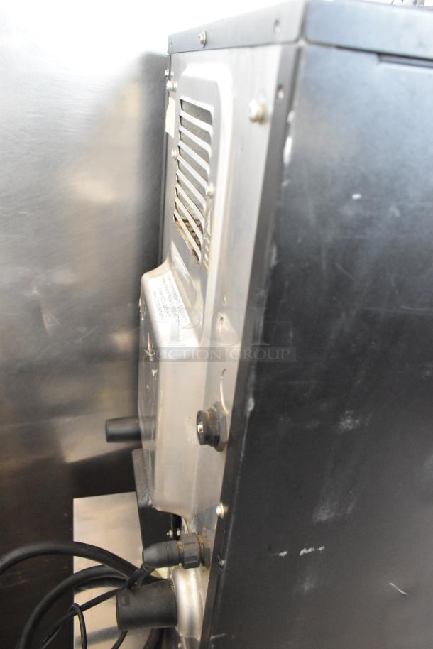 Merrychef eikon e2s rapid cook oven, metal body, electric, 208/240V, countertop model. Door issue noted.