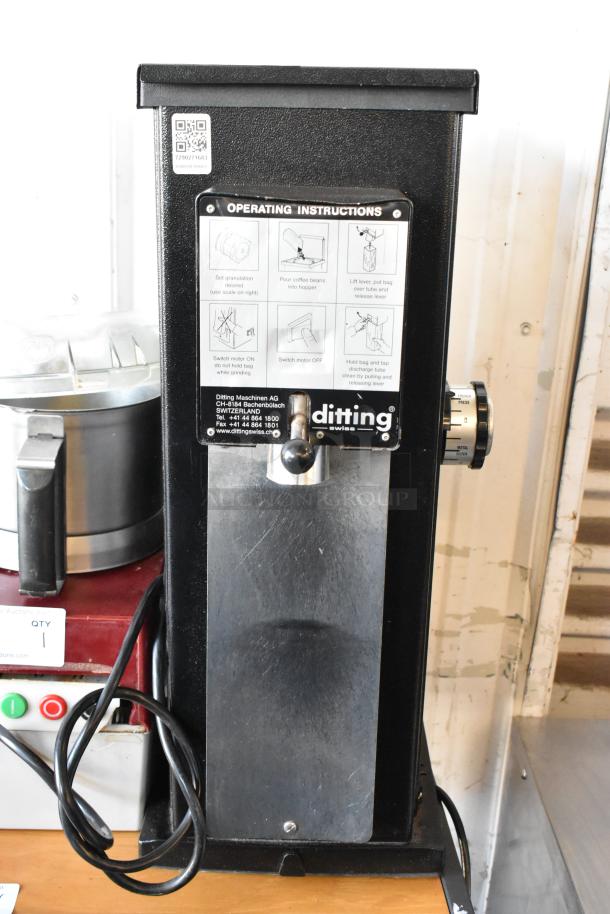 2017 Ditting KR1203 commercial coffee grinder, metal body, operating instructions visible, 120 volts, 1 phase, excellent condition.