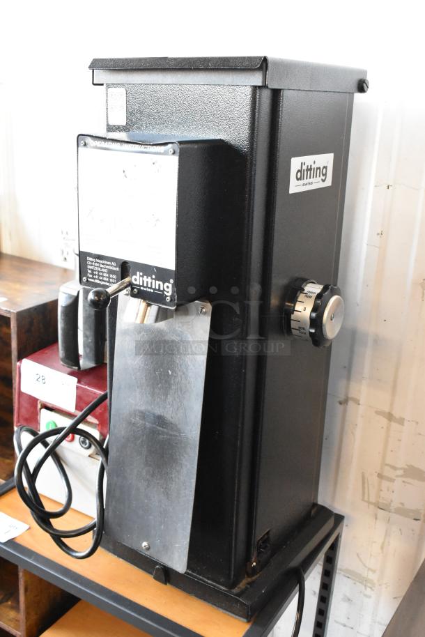 2017 Ditting KR1203 metal commercial coffee grinder, black, 120V, 1 phase. Features a speed control knob and branded label.
