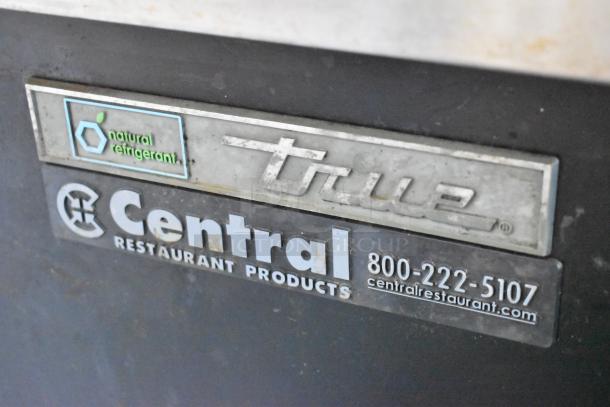 2017 True TBB-4-HC 3-door back bar cooler, metal, 115V, natural refrigerant label, Central Restaurant Products contact info.