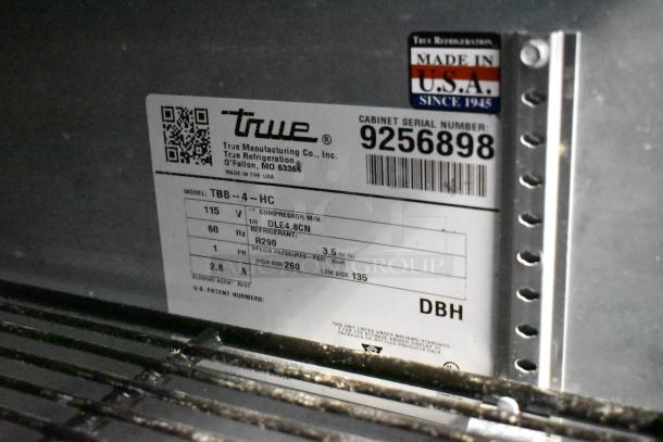 2017 True TBB-4-HC metal commercial 3-door back bar cooler label, 115V, 1 phase, Made in USA, model details shown.
