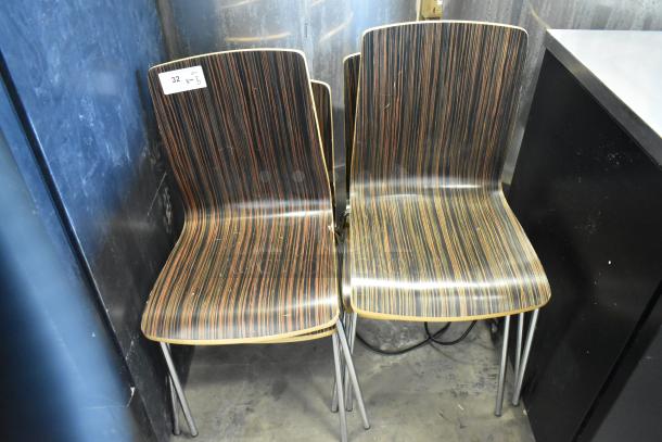 Five wood pattern dining-height chairs with metal legs, slight wear visible, quantity tag shows "32 QTY 5".