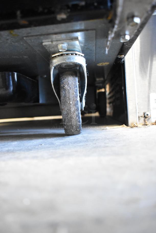 2018 True TBB-1-HC undercounter cooler with metal commercial casters. 115V, 1 Phase. Single door, sturdy design.