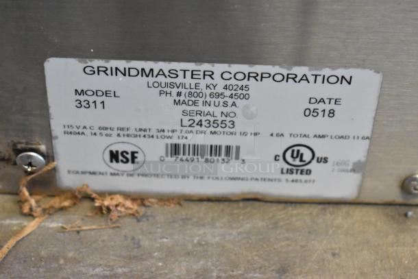 2018 Crathco 3311 stainless steel frozen beverage machine label, showing model, serial number L243553, and specs.