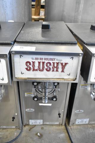 2018 Crathco 3311 stainless steel frozen beverage machine, single flavor, 115 volts, 1 phase, with "SLUSHY" label.
