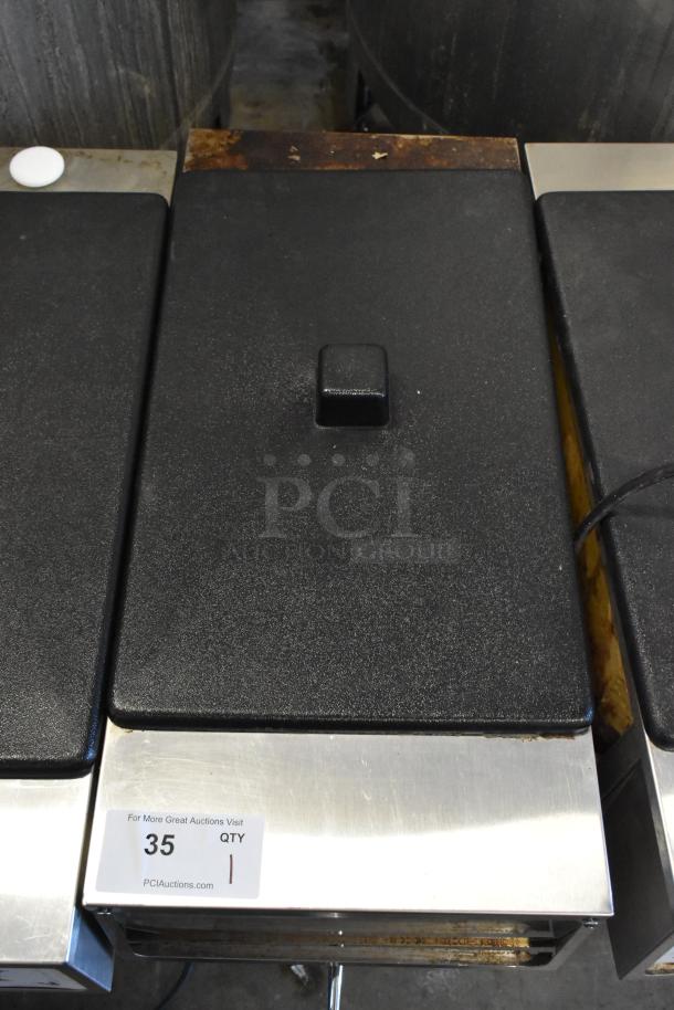 2018 Crathco 3311 stainless steel frozen beverage machine, single flavor, 115V, 1 phase, good condition, auction label visible.