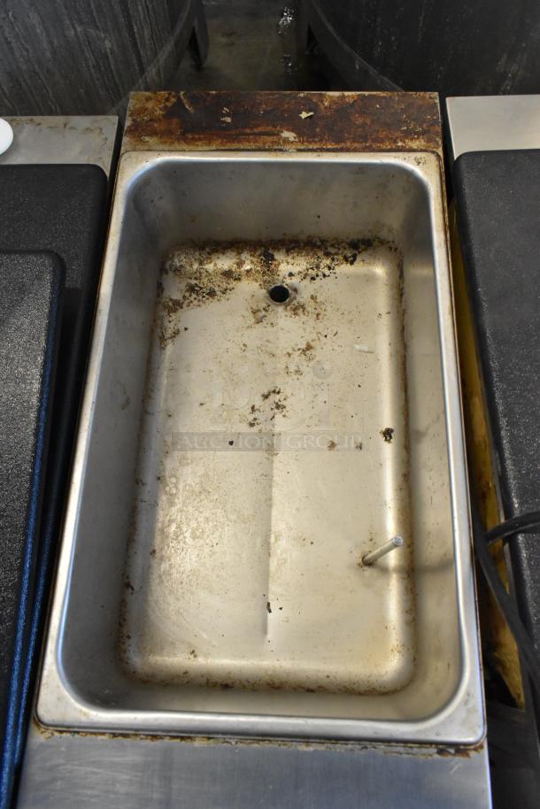 2018 Crathco 3311 frozen beverage machine, stainless steel, rusty exterior, used condition, 115 volts, 1 phase.