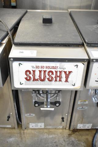 2018 Crathco 3311 stainless steel frozen beverage machine, single flavor, countertop model, 115V, with holiday sign.