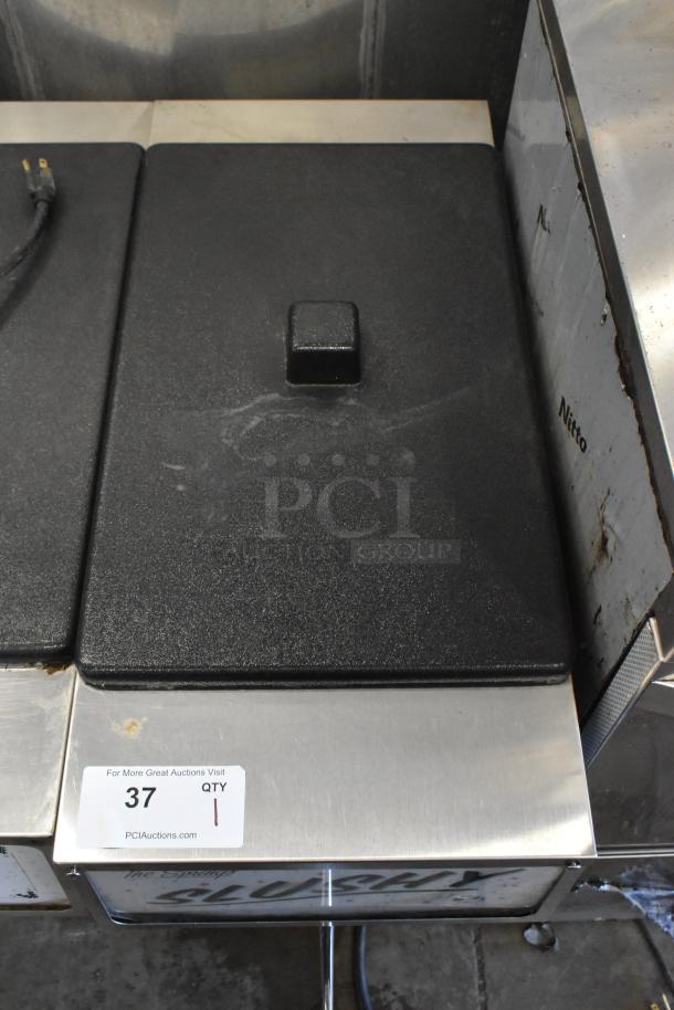 2018 Crathco 3311 stainless steel frozen beverage machine, countertop model, 115 volts, with auction label.