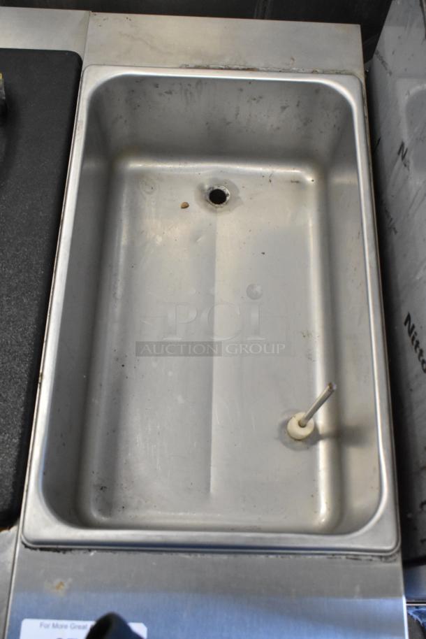 2018 Crathco 3311 stainless steel beverage machine, single flavor. Visible interior, some wear. 115V, 1 phase.