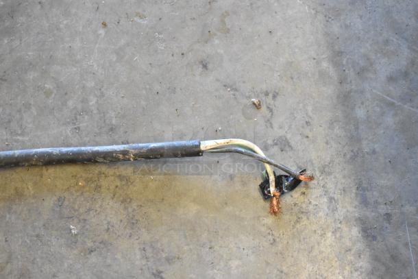 Frayed power cord from a 2019 Fagor COP-504W stainless steel commercial undercounter dishwasher, requiring repair.