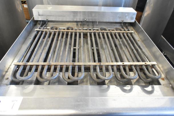 Star Max stainless steel electric countertop grill, visible heating elements, lightly used, ideal for commercial use.