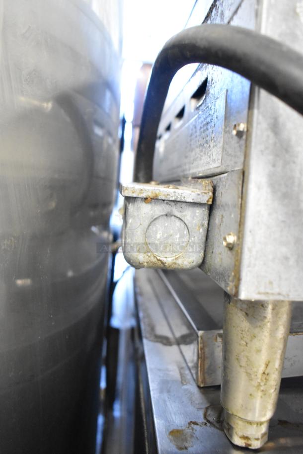 Star Max Stainless Steel Commercial Electric Grill, showing surface wear, suitable for countertop use in commercial kitchens.